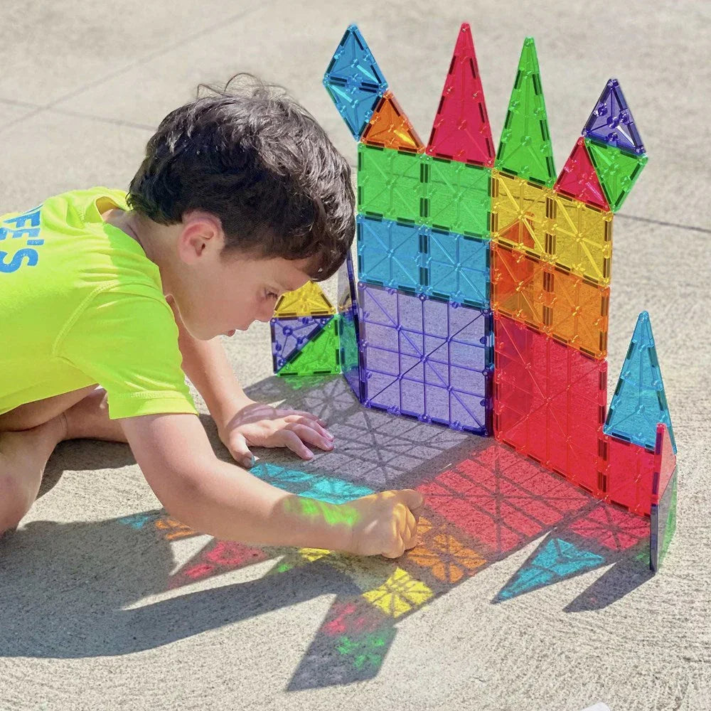 Child playing with colorful building blocks 