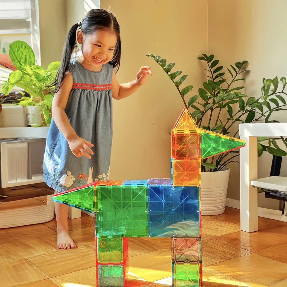 Child playing with colorful building blocks indoors