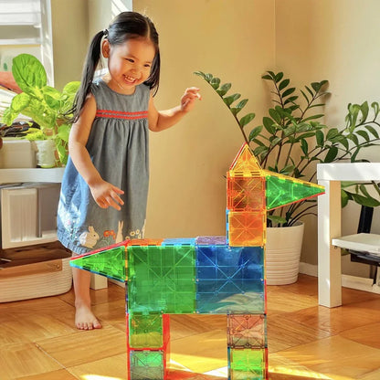 Child playing with colorful building blocks indoors