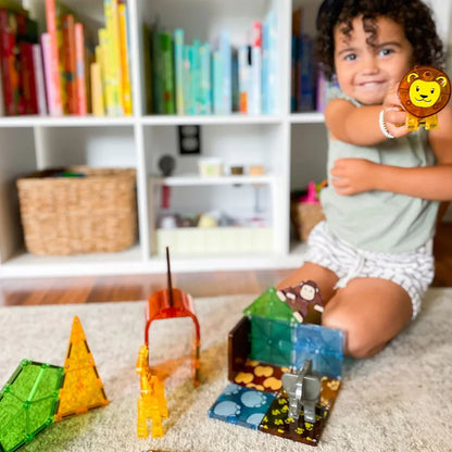 Child playing with toy building blocks 