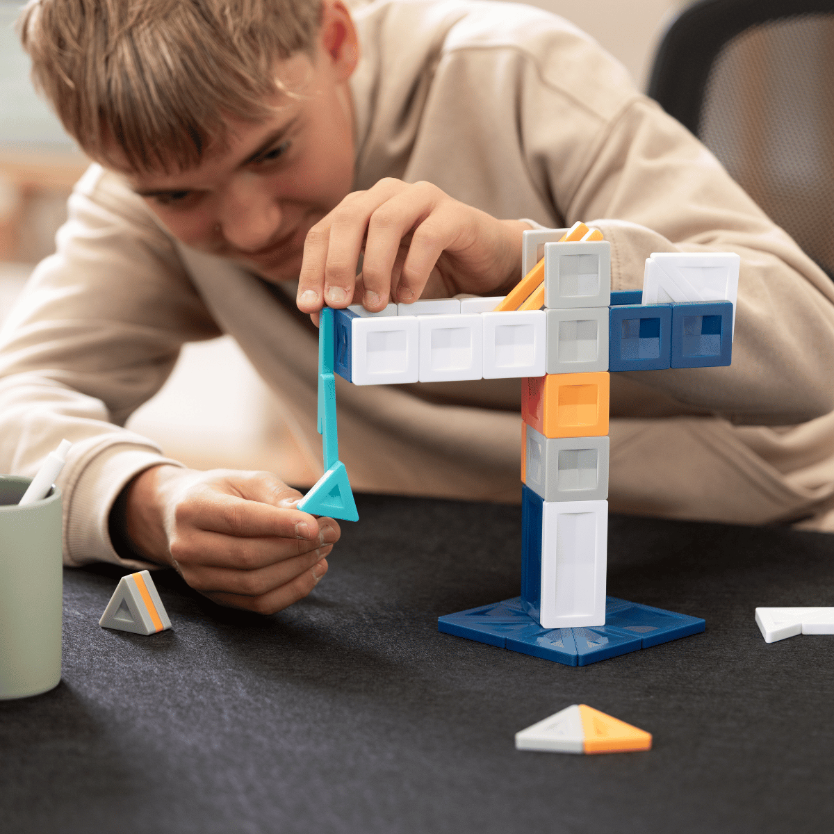Child playing with building blocks