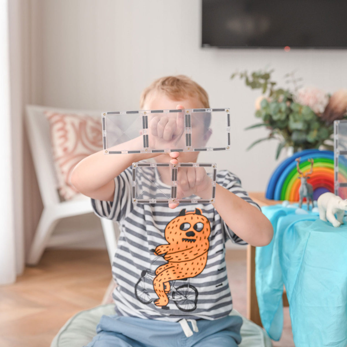 Child wearing a striped shirt 