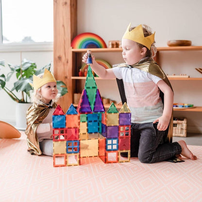 Children creating large magnetic tile structures with Connetix Rainbow Creative Pack