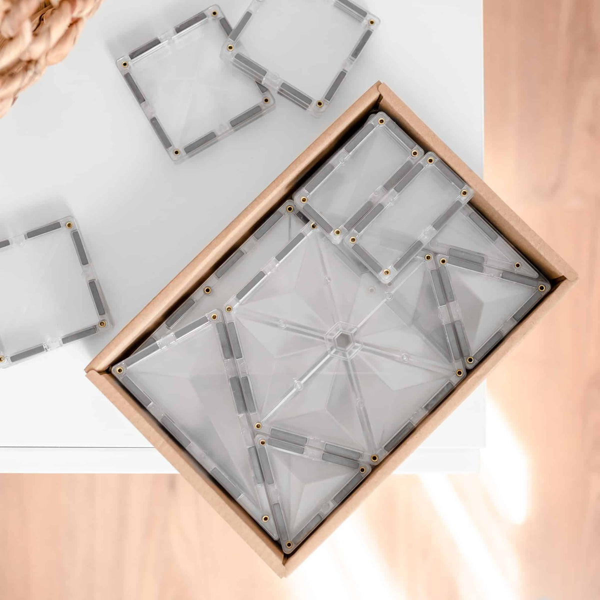 Clear geometric coasters in a wooden box