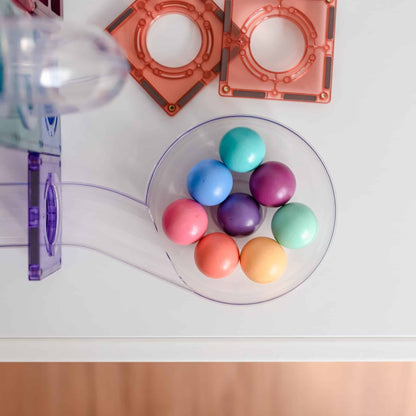 Colorful balls in a clear container