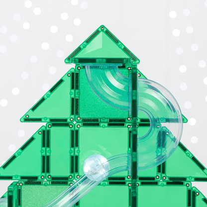 Close-up of a Christmas tree structure built with green magnetic tiles