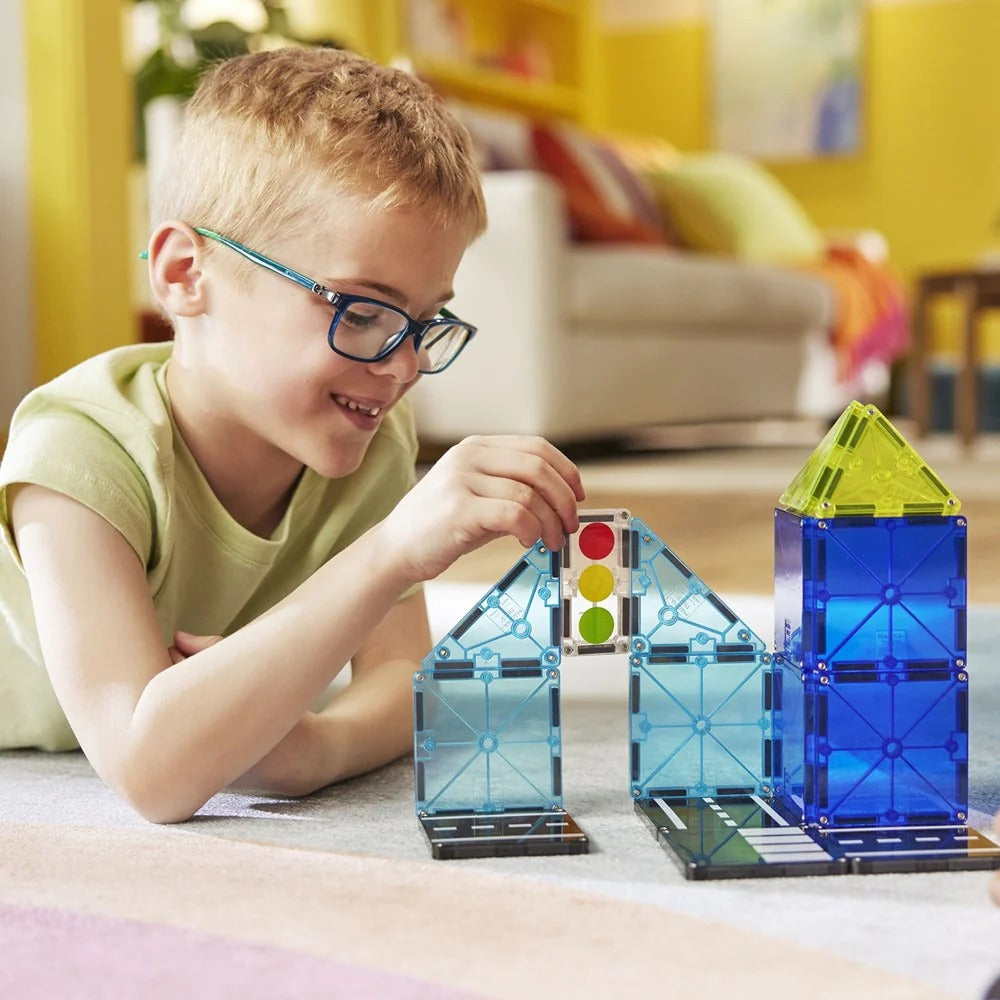 Child playing with colorful building blocks