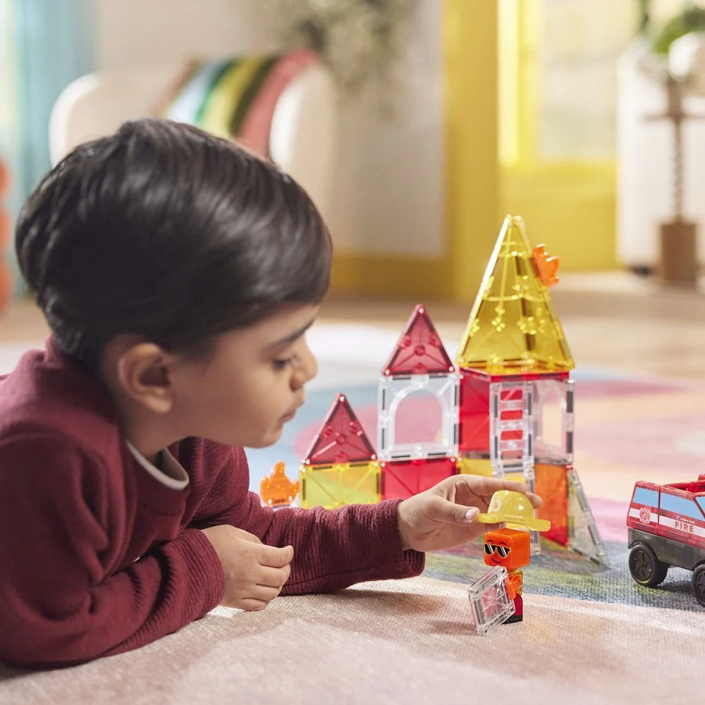 Child playing with colorful building blocks