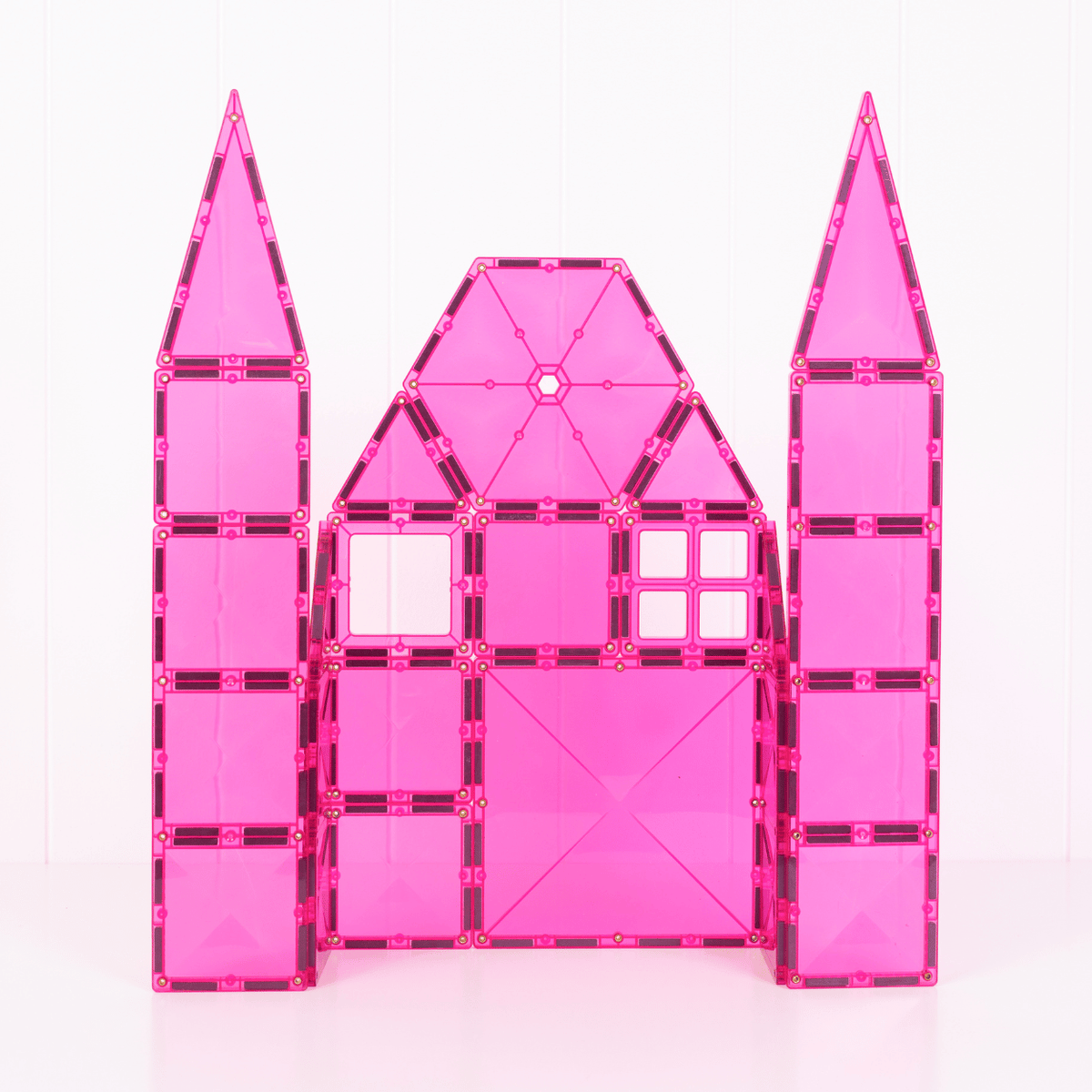 Pink toy castle structure 
